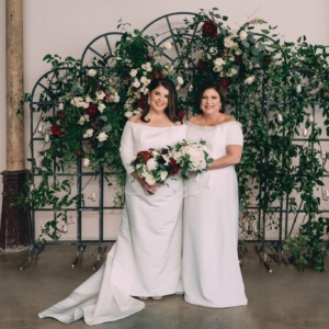 wedding ceremony backdrop greenery vines and flower decor for same sex wedding in new orleans by floral designer kim starr wise