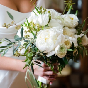 kim starr wise floral events in new orleans spring wedding with asymmetrical organic white bridal bouquet ranunculus veronica peony