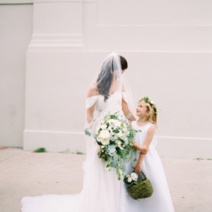 Bride and flowergirl on wedding day