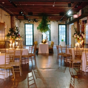 wedding reception seated dinner tablescapes floral decor in new orleans for fall wedding by kim starr wise
