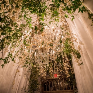 elegant wedding florals for january wedding in new orleans louisiana event florals by kim starr wise created dreamy secret garden with vines and flowers for wedding ceremony entrance with chandeliers