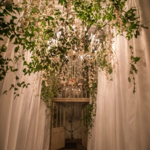 elegant wedding florals for january wedding in new orleans louisiana event florals by kim starr wise created dreamy secret garden with vines and flowers for wedding ceremony entrance with chandeliers