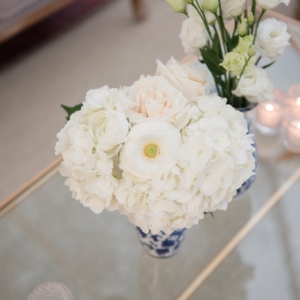 petite floral arrangements adorned the Coffee Tables Centerpieces at wedding reception on st charles avenue in new orleans louisiana by master wedding event florist kim starr wise
