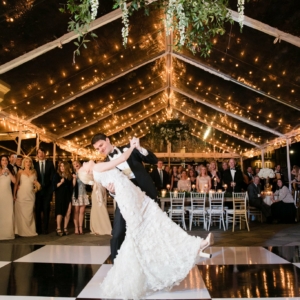 Chandelier Decor in the clear-top tent for outdoor wedding in new orleans louisiana flowers and foliage used in the rain plan in clear top tent to decorate a large hoop hung in the main tent by kim starr wise wedding florist