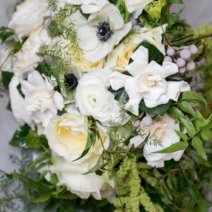 new orleans winter wedding floral arrangements kim starr wise latrobes bridal bouquet with gardenias, garden roses, ranunculus, anemones