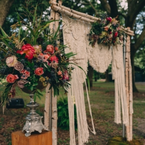 new orleans wedding floral arrangements kim starr wise macrame wedding altar backdrop boho style