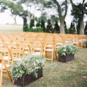 aisle decor at mississippi gulf coast wedding in october wedding ceremony with textured greenery foliage and wildflowers